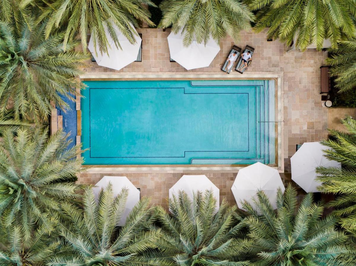 Jumeirah Dar Al Masyaf Dubaj Kültér fotó Aerial view of the pool at the Four Seasons Hotel