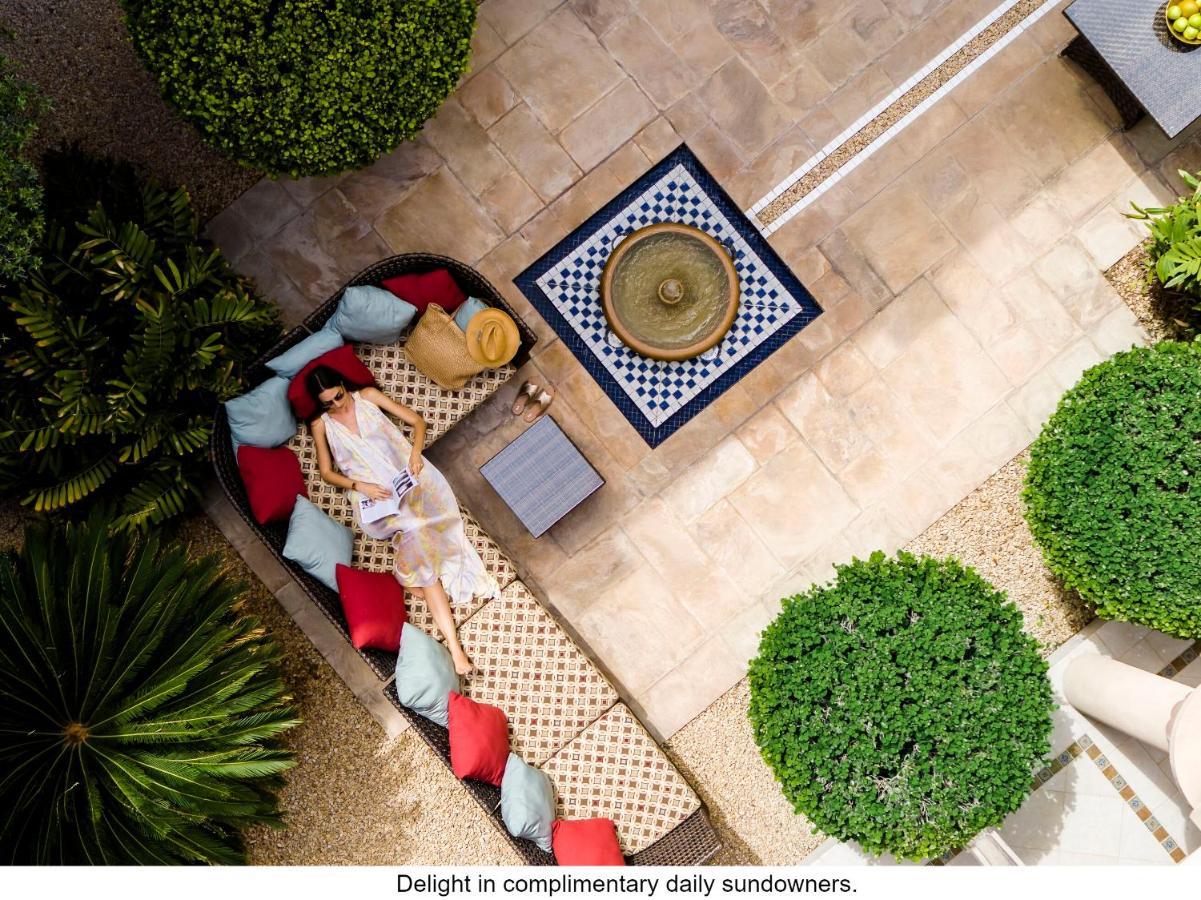 Jumeirah Dar Al Masyaf Dubaj Kültér fotó The courtyard at the Four Seasons Hotel, Marrakech